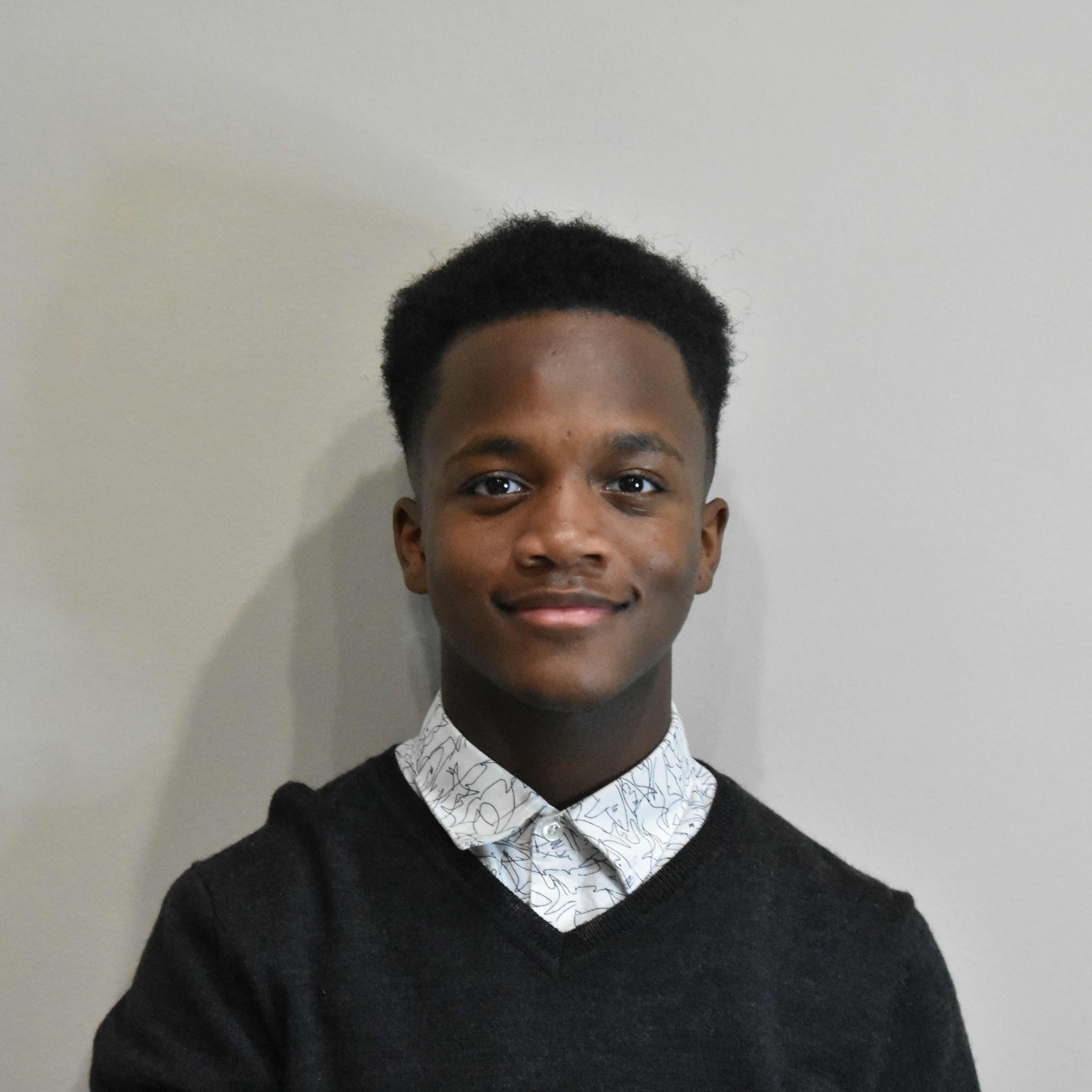 A headshot of Dylan Borel